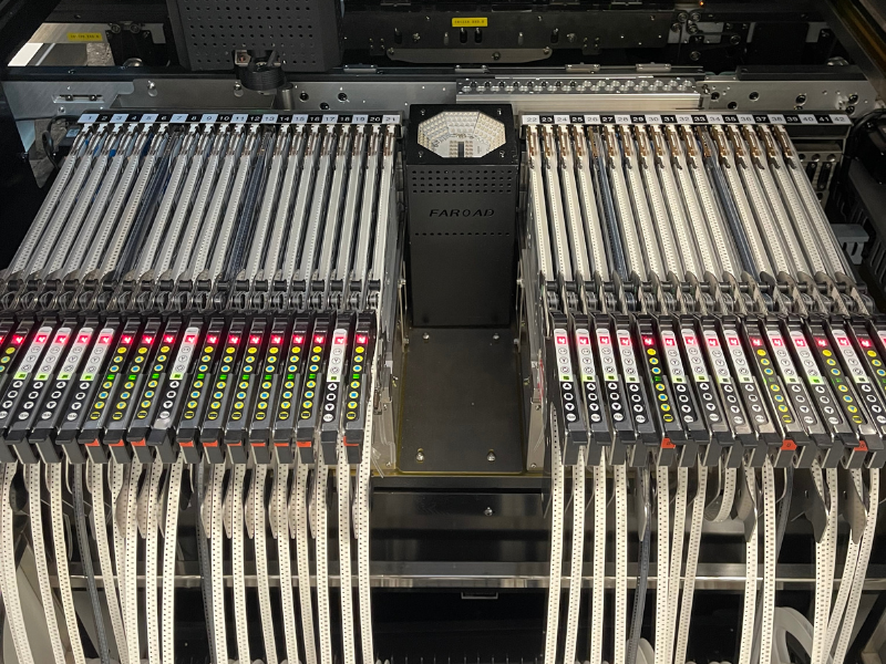 High-precision feeder bank for Pick and Place machinery in an SMT assembly line.